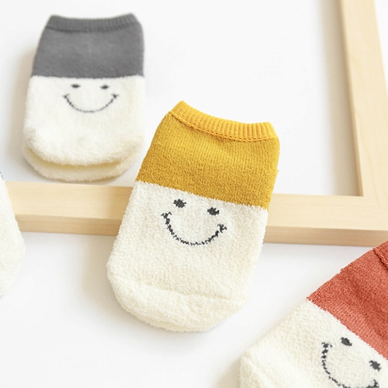 Kindersocken Herbst und Winter Cartoon Smiley Gesicht mit plüschigen Babyschleifensocken Kindersocken Herbst und Winter Cartoon Smiley Gesicht mit plüschigen Babyschleifensocken